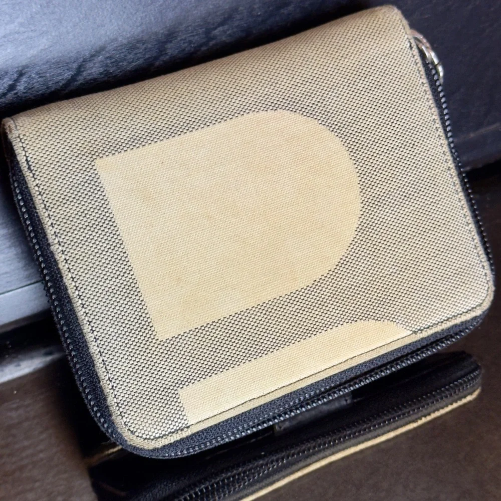 Bally Black Cream Woven Leather Bi Fold Wallet